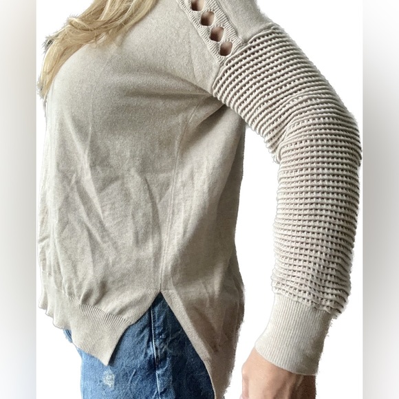 Fabulous neutral for all seasons. Fun peek-a-boo detailing along back & sleeves - Picture 3 of 8